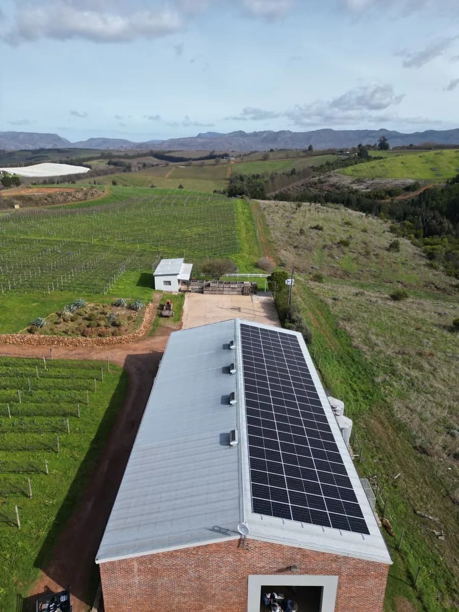 Aerial view of the solar-roofed organic cellar among the Elgin vineyards