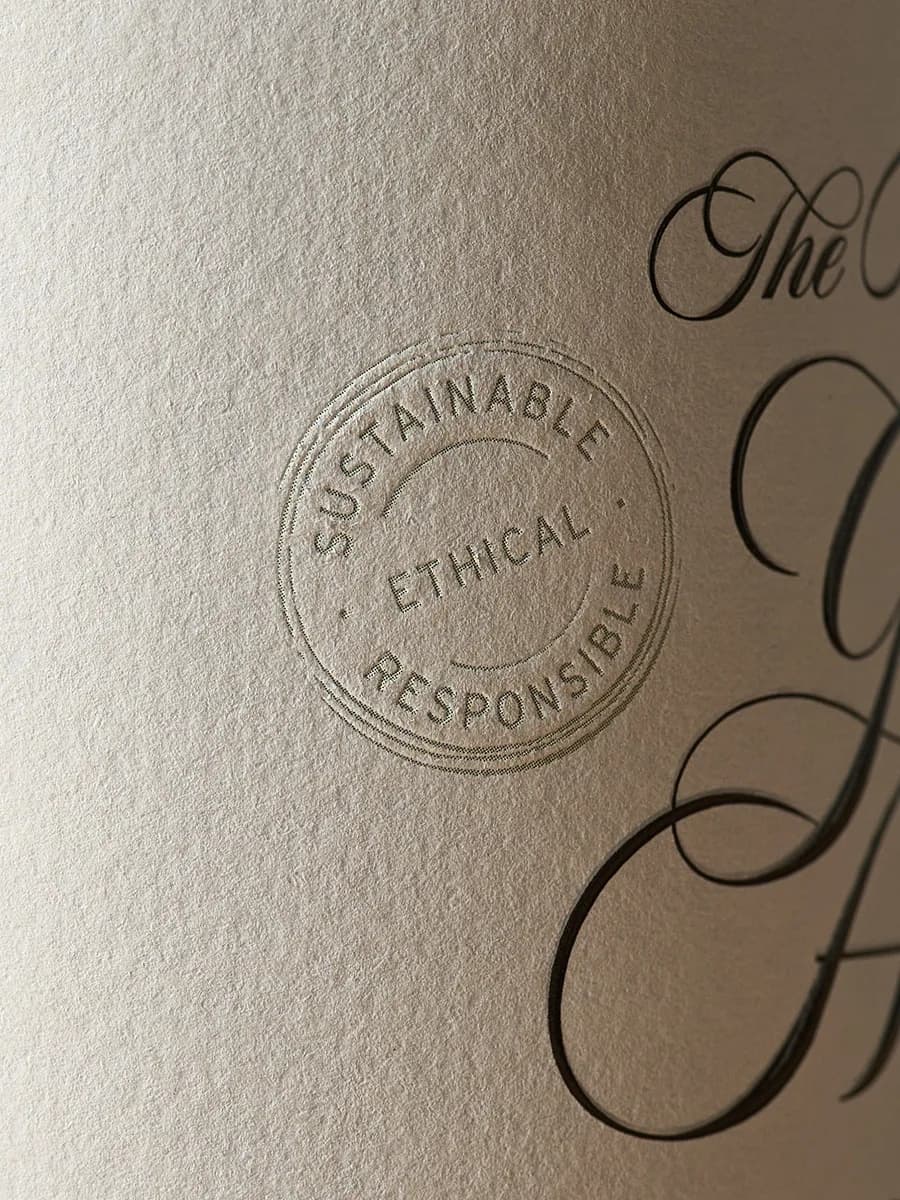 The embossed Sustainable, Ethical, Responsible seal on the label