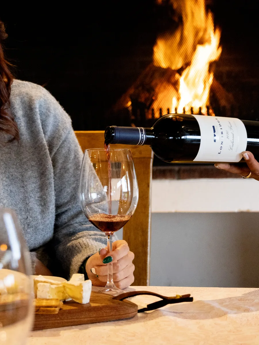 Longridge wine poured fireside for a tasting